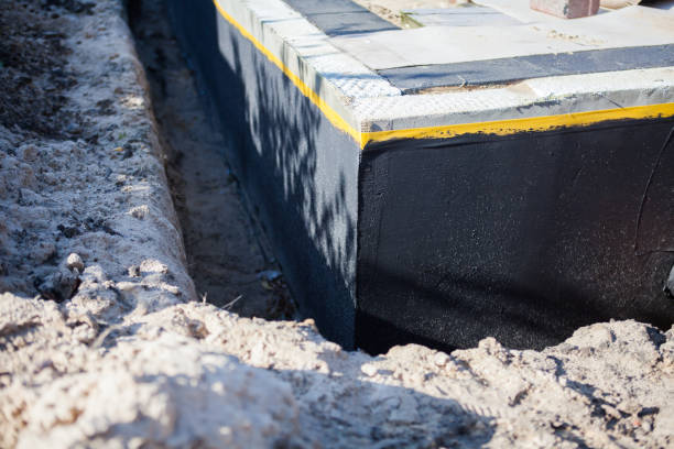 Professional Emergency Waterproofing technician working in Richland, GA